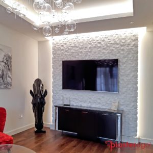 rivestimenti decorativi in gesso_decoro esagonale_superficie 3d_plasterego_parete salotto_decorative wall panels